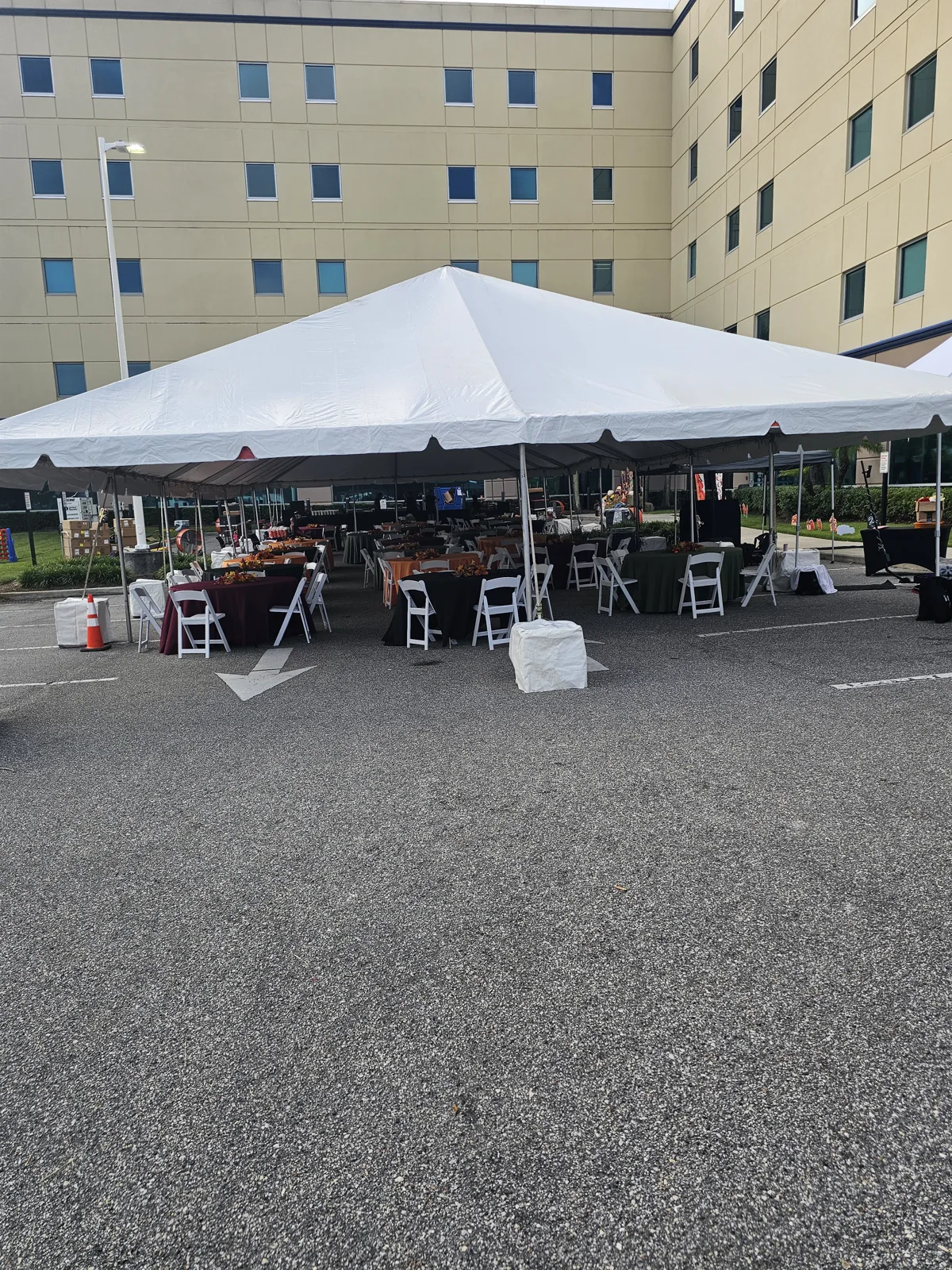 Fall Festival tables and chairs arranged under the event tent