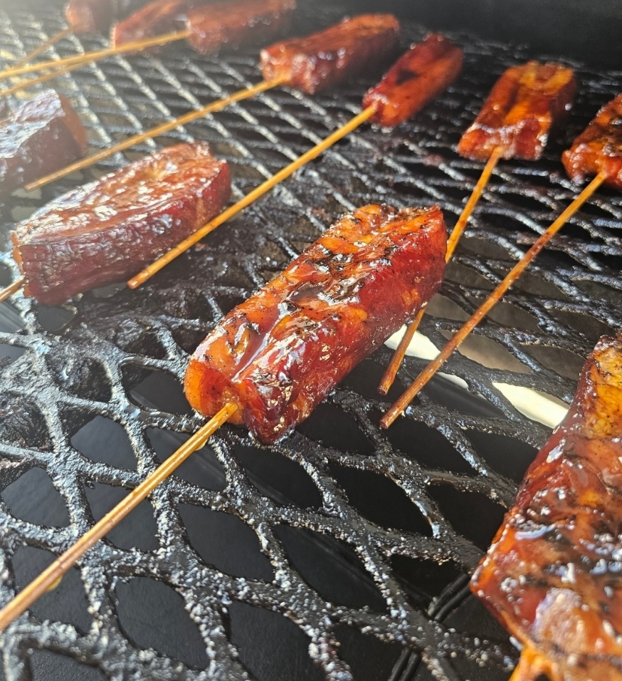 Glazed pork belly popsicles
